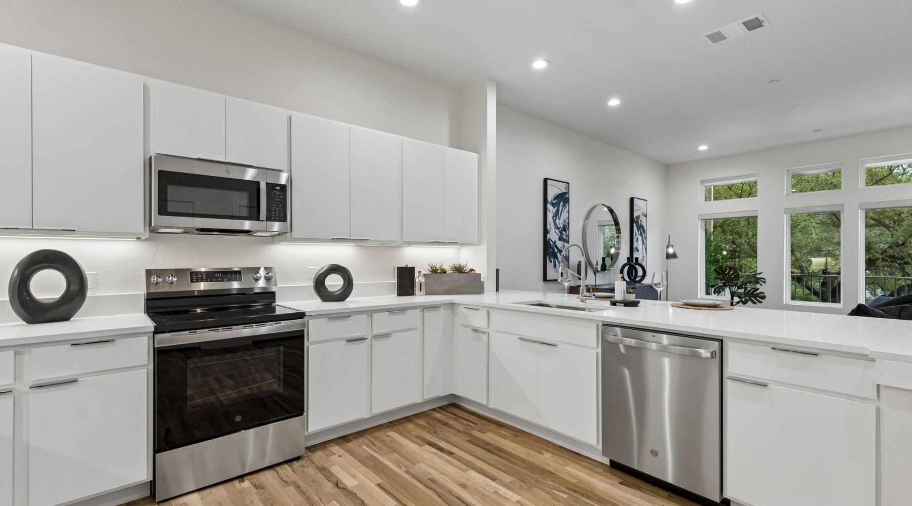 kitchen with white cabinets and stainless steel appliances